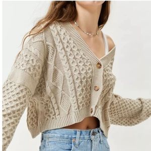 Cropped cable knit cardigan